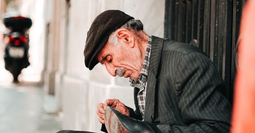 Daily Life - Man Holding Black Leather Dress Shoe