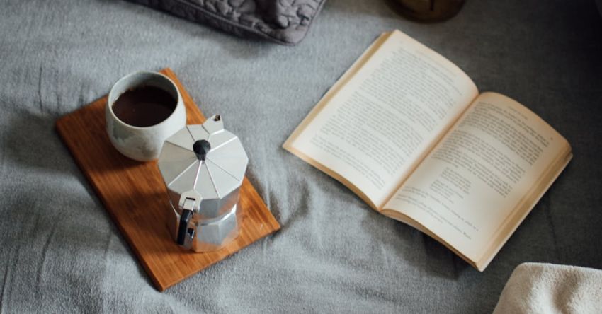 Visual Story - Coffee with book on cozy bed